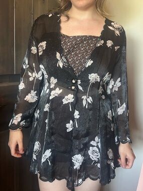 black sheer long sleeve top with white florals (about a med-large)